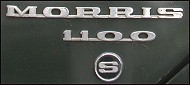 1100 S badge