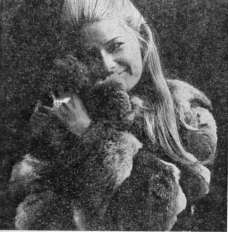 Picture of young woman with a fur coat